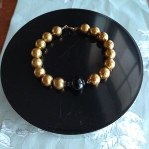 vint. brass bracelet